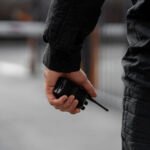 portrait-male-security-guard-with-radio-station